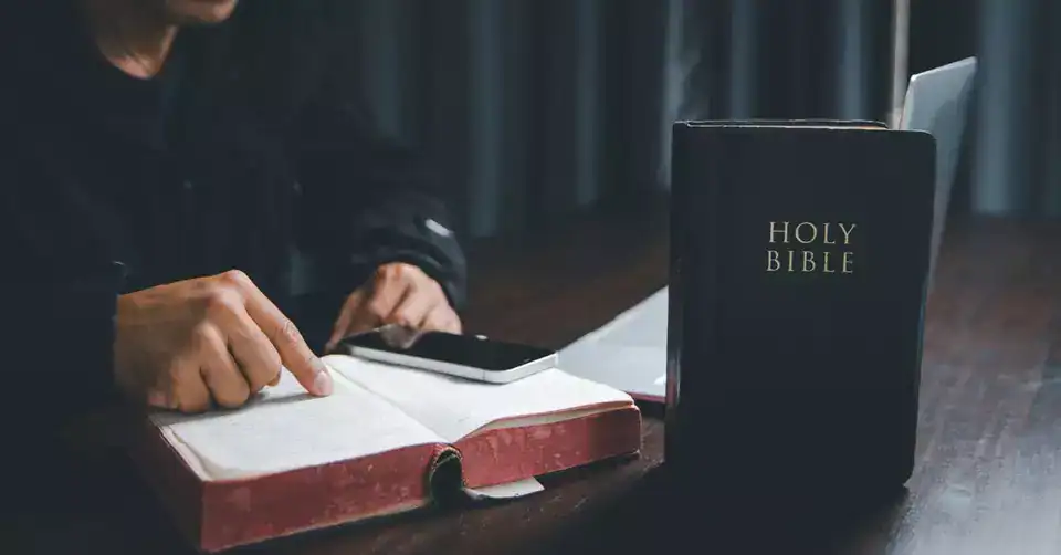 man reading the Bible
